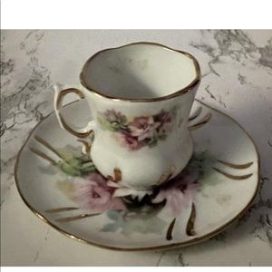 Tea cup and Saucer The Lamport House.